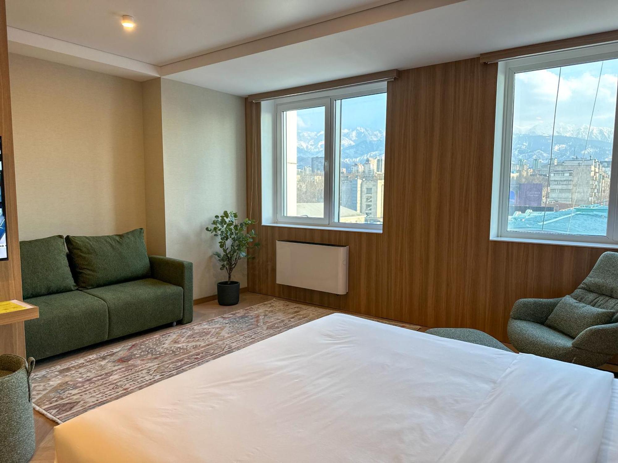 Resident Hotel Abay Алматы Экстерьер фото